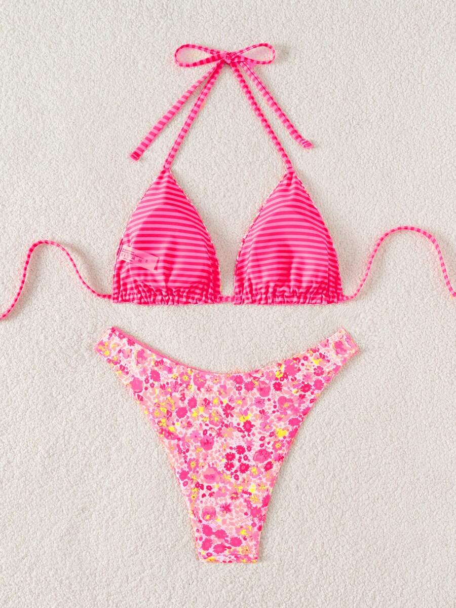 Women's two-piece halter bikini set featuring high cut thong bottoms and removable padding