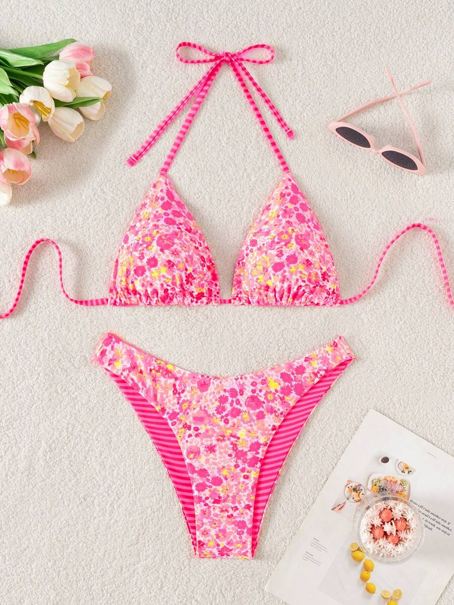 Women's two-piece halter bikini set featuring high cut thong bottoms and removable padding