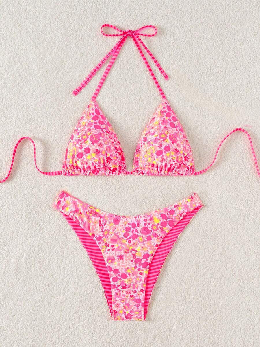 Women's two-piece halter bikini set featuring high cut thong bottoms and removable padding