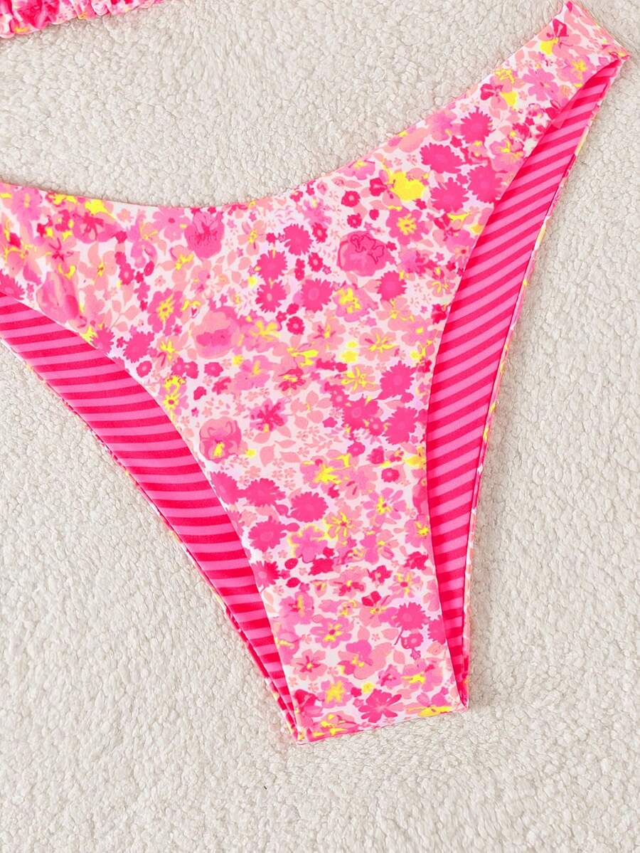 Women's two-piece halter bikini set featuring high cut thong bottoms and removable padding