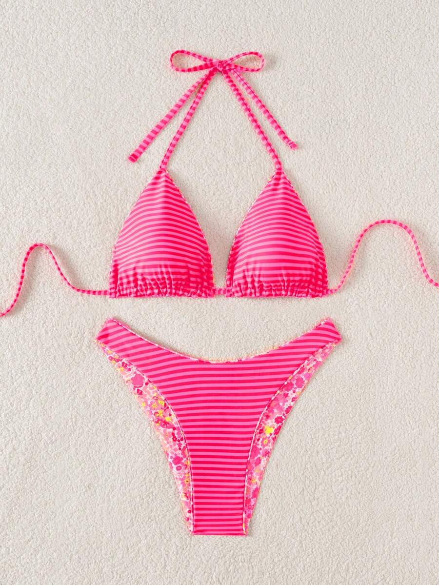 Women's two-piece halter bikini set featuring high cut thong bottoms and removable padding