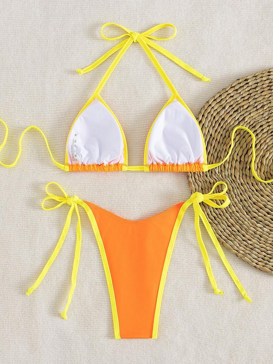 Women's two-piece halter triangle bikini set featuring a backless tie-back top with removable padding and matching tie-side mid-waist bottoms.