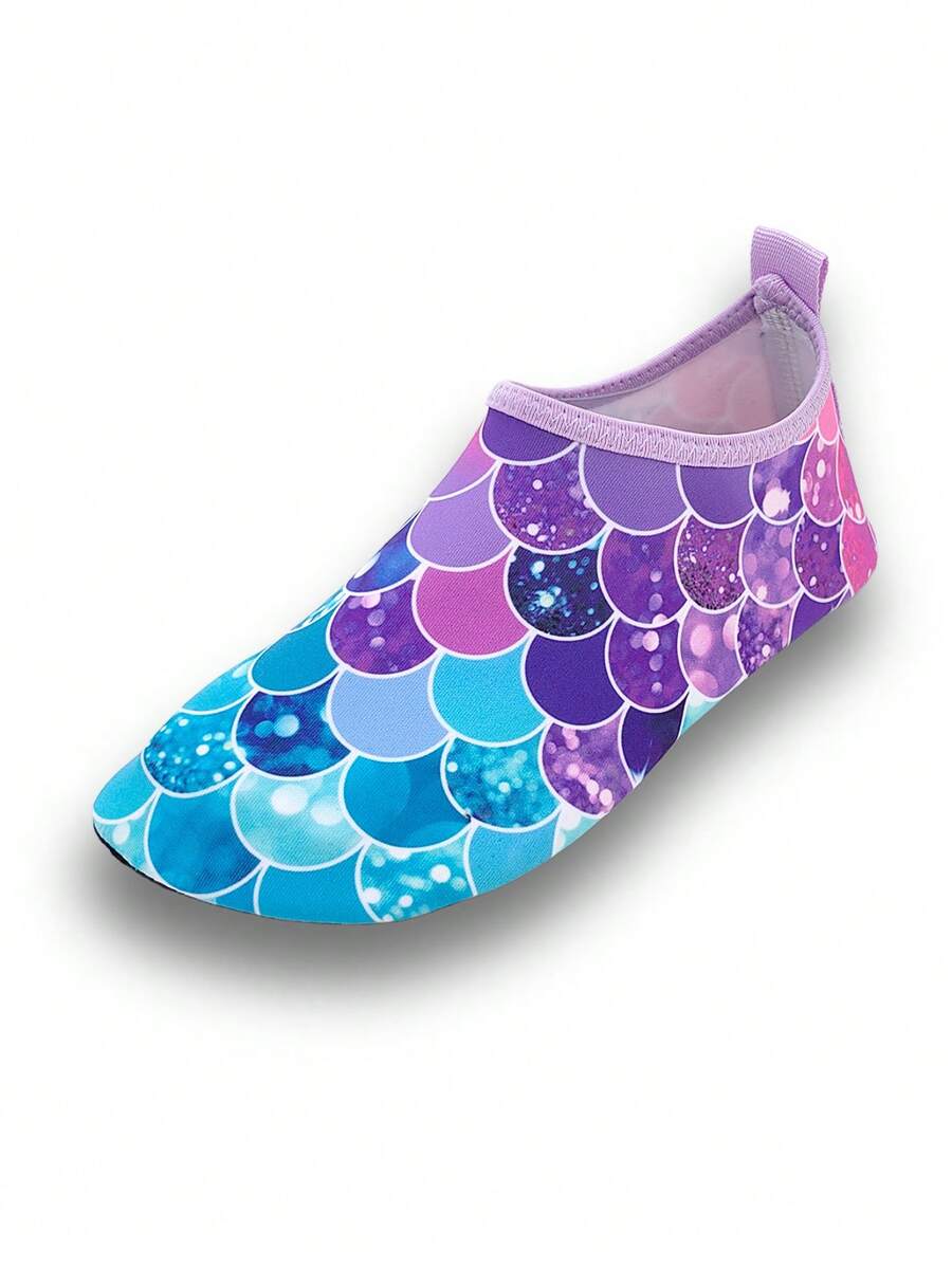 Girls purple slip-on water sandals with a textured fish scale pattern, breathable fabric upper, and flexible TPR sole.