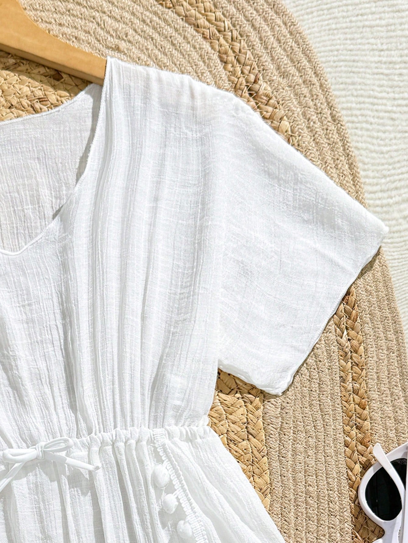 White tween girls swimsuit cover-up with V neck, short sleeves, contrast lace, fringe details, and regular length mesh fabric for beachwear