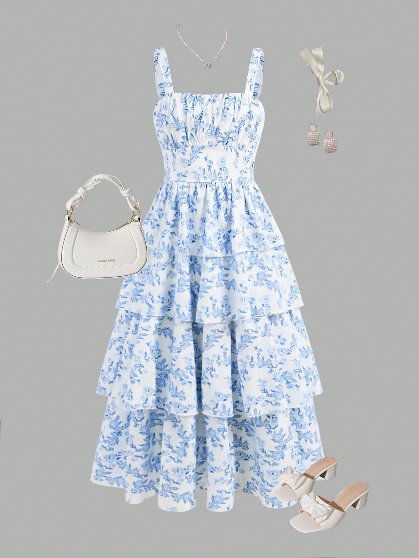 Tween girls blue ditsy floral sleeveless long dress with spaghetti straps, ruched bust, high waist, and tiered layered hem.