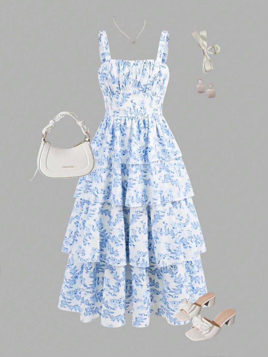 Tween girls blue ditsy floral sleeveless long dress with spaghetti straps, ruched bust, high waist, and tiered layered hem.