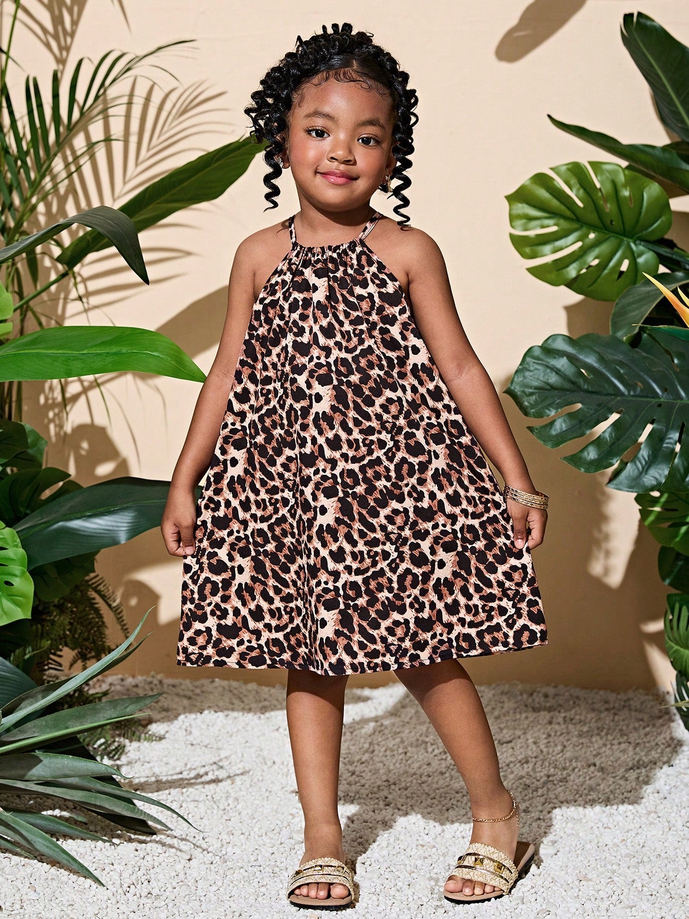 Tween girls floral halter neck sleeveless tunic dress with button detail, plant pattern, loose fit, short length, and vacation style for casual summer wear.