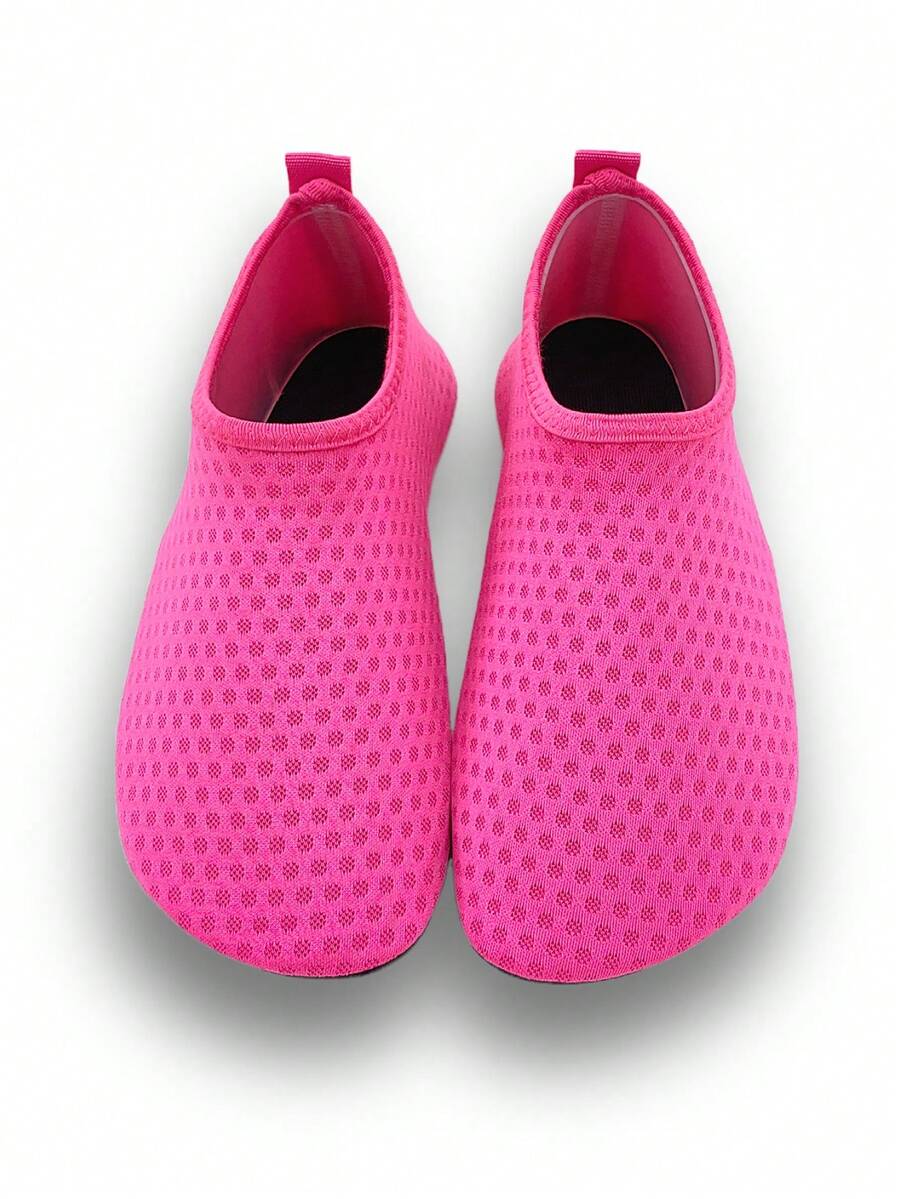 Girls breathable slip-on aqua socks for swimming and beach water sports featuring fabric upper and TPR outsole