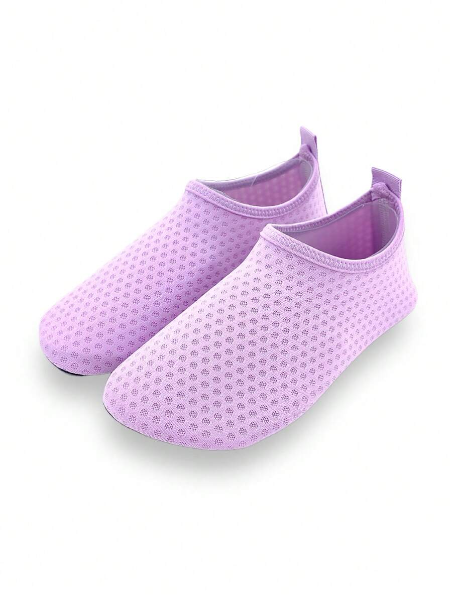 Girls breathable slip-on aqua socks for swimming and beach water sports featuring fabric upper and TPR outsole