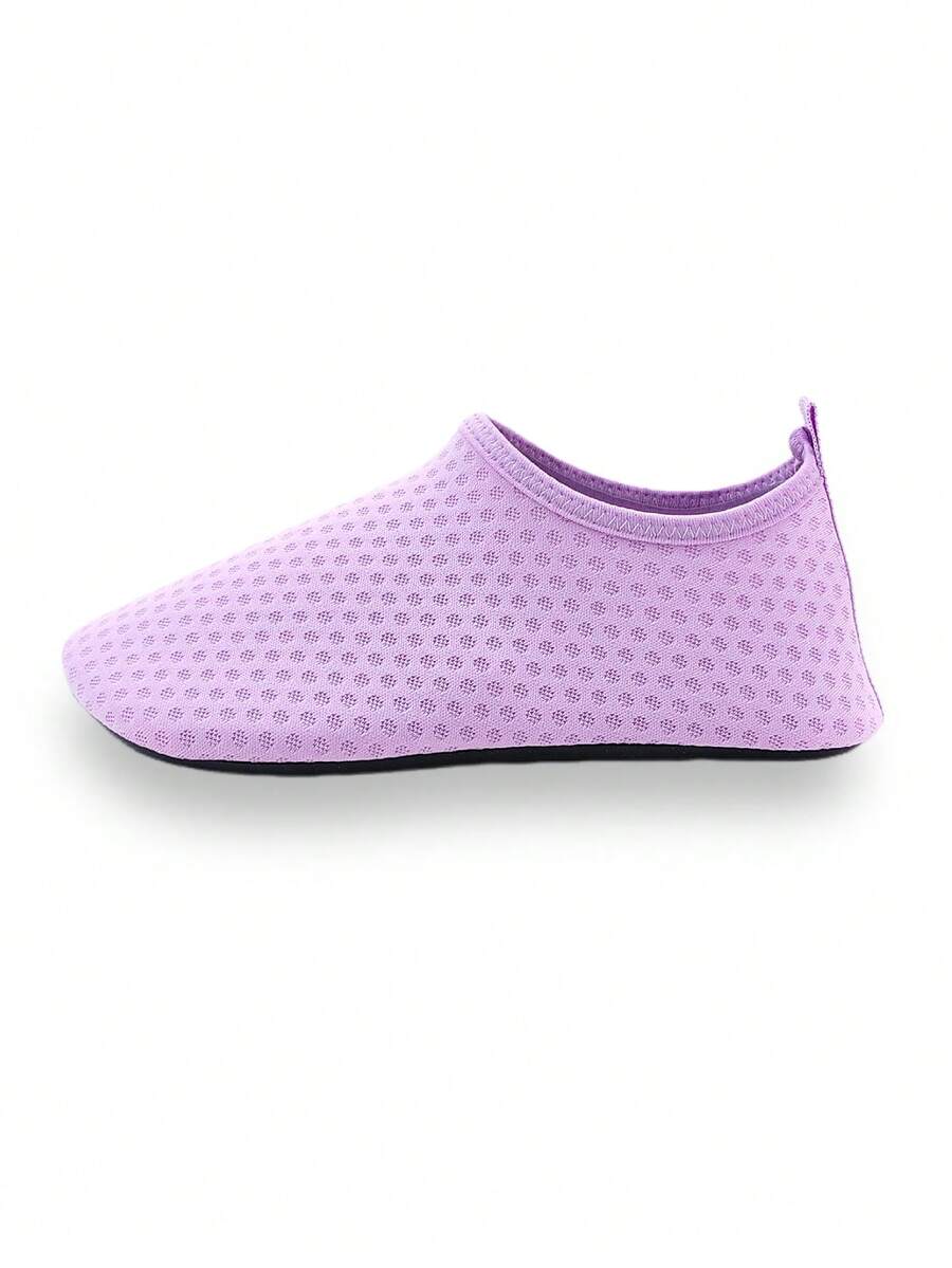 Girls breathable slip-on aqua socks for swimming and beach water sports featuring fabric upper and TPR outsole