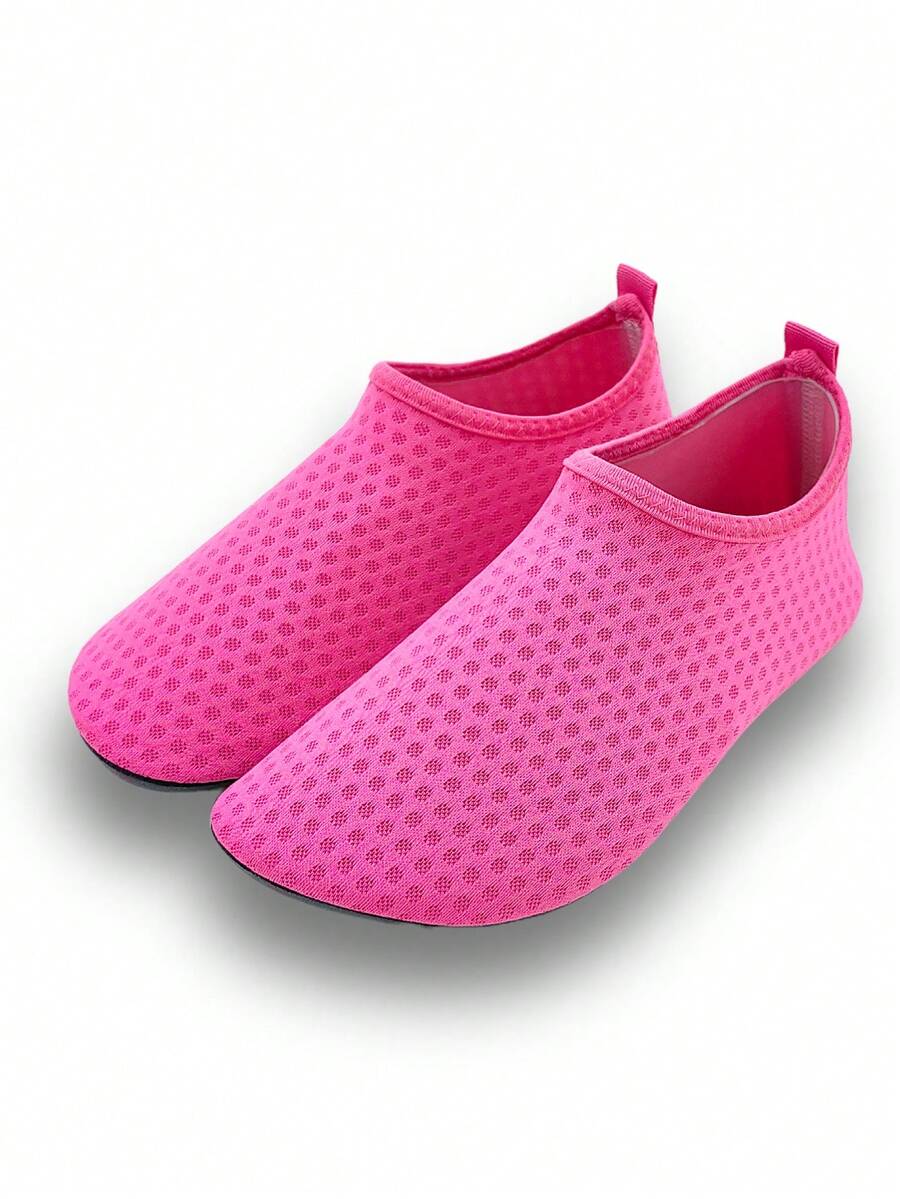 Girls breathable slip-on aqua socks for swimming and beach water sports featuring fabric upper and TPR outsole