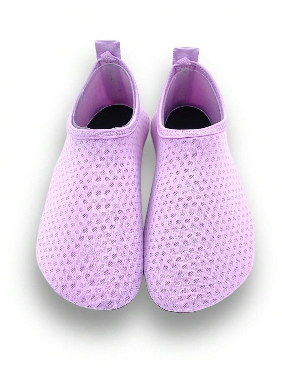 Girls breathable slip-on aqua socks for swimming and beach water sports featuring fabric upper and TPR outsole
