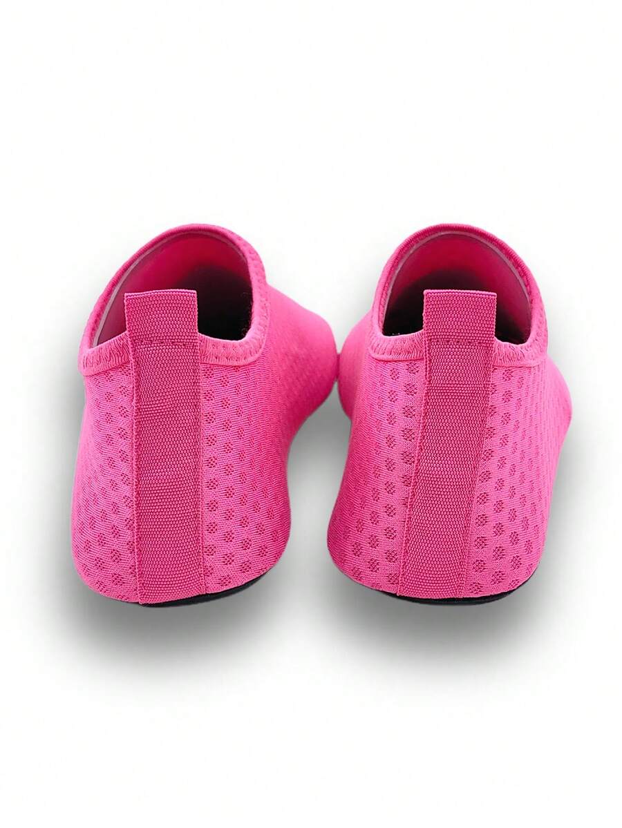Girls breathable slip-on aqua socks for swimming and beach water sports featuring fabric upper and TPR outsole
