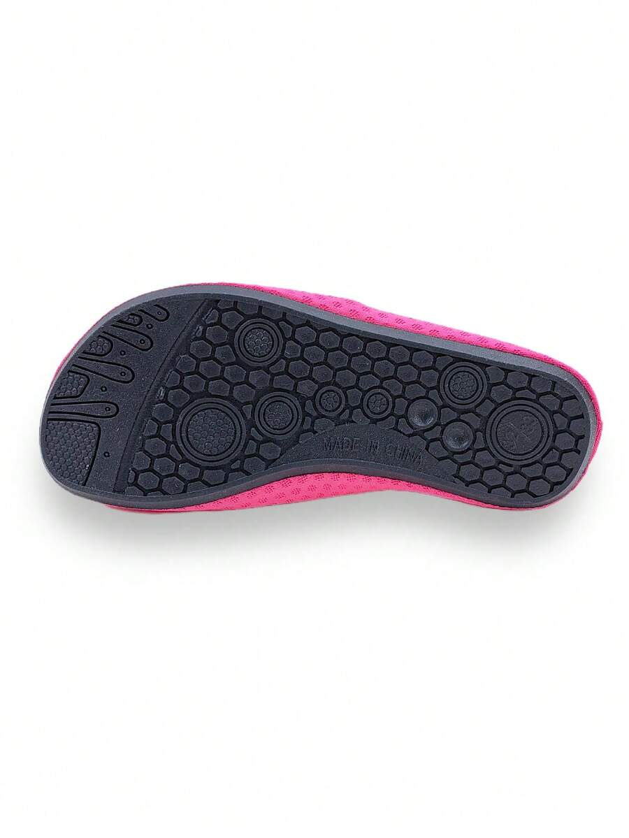 Girls breathable slip-on aqua socks for swimming and beach water sports featuring fabric upper and TPR outsole