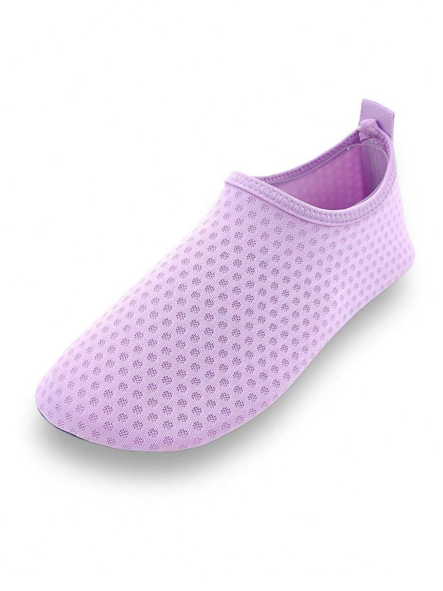 Girls breathable slip-on aqua socks for swimming and beach water sports featuring fabric upper and TPR outsole