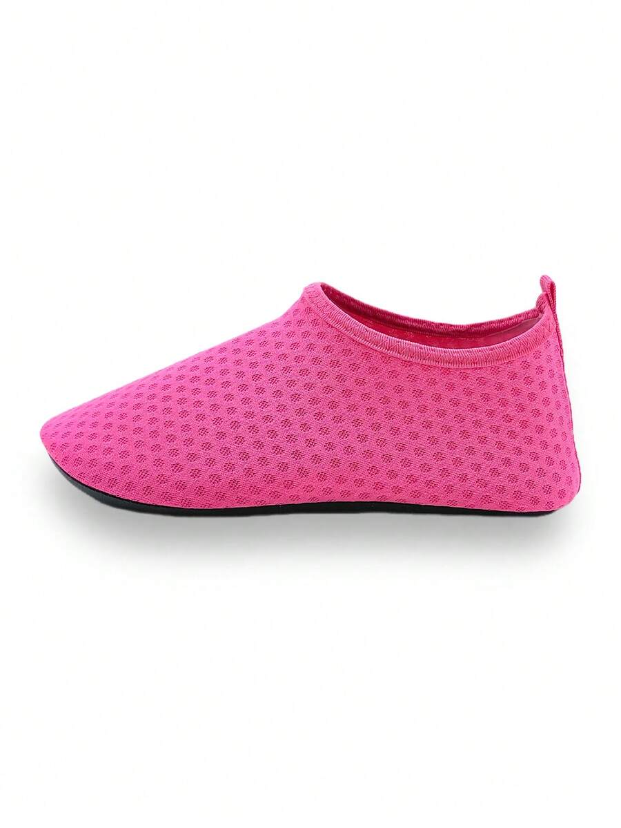 Girls breathable slip-on aqua socks for swimming and beach water sports featuring fabric upper and TPR outsole