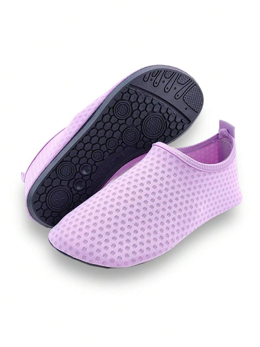 Girls breathable slip-on aqua socks for swimming and beach water sports featuring fabric upper and TPR outsole