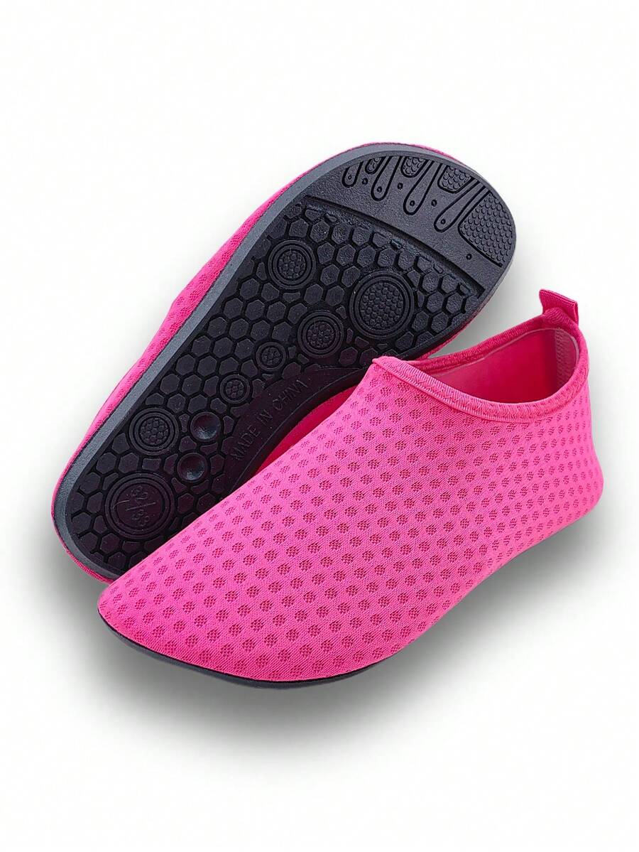 Girls breathable slip-on aqua socks for swimming and beach water sports featuring fabric upper and TPR outsole
