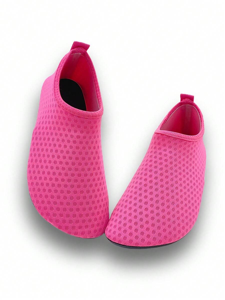 Girls breathable slip-on aqua socks for swimming and beach water sports featuring fabric upper and TPR outsole