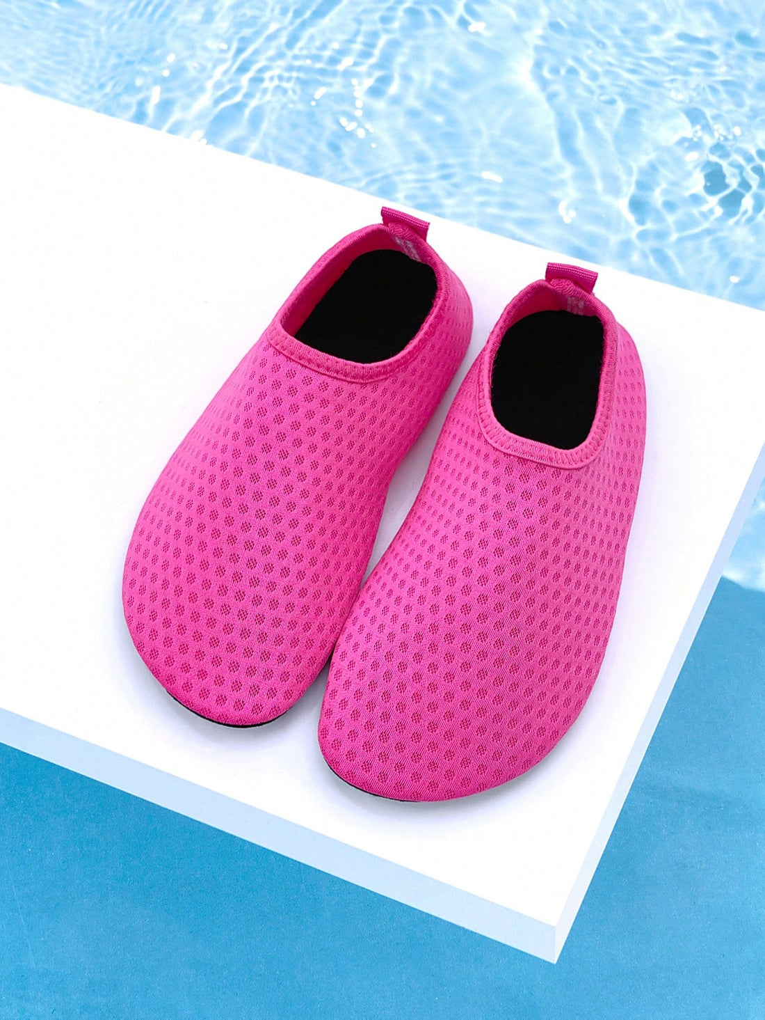 Girls breathable slip-on aqua socks for swimming and beach water sports featuring fabric upper and TPR outsole