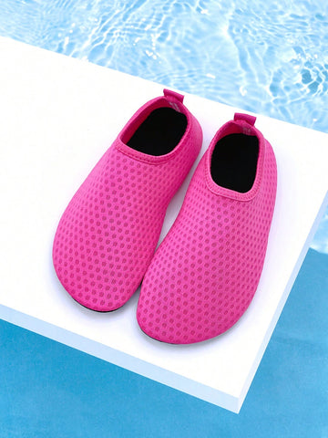 Girls breathable slip-on aqua socks for swimming and beach water sports featuring fabric upper and TPR outsole