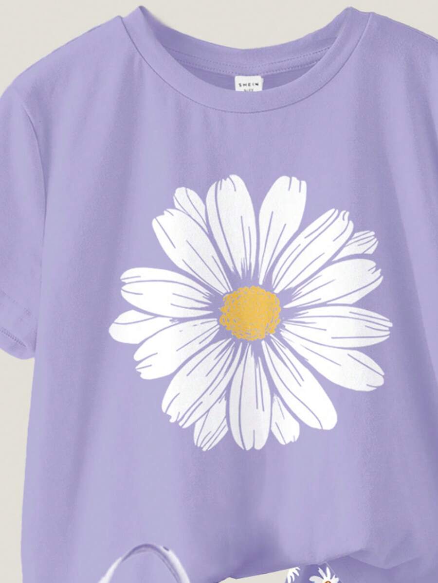 Tween girls 2-piece summer casual outfit featuring a multicolor seashell print short sleeve T-shirt with drop shoulders and matching loose fit shorts with pockets.