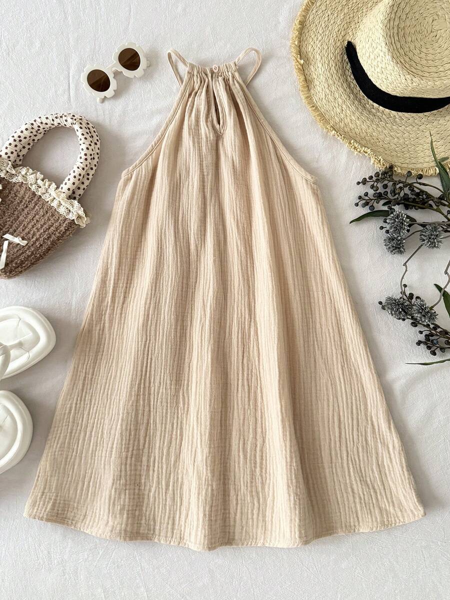 Tween girls floral halter A-line dress with contrast lace, applique and fringe details, sleeveless short length in polyester
