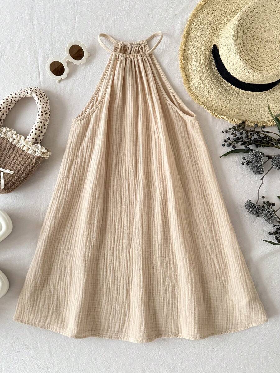 Tween girls floral halter A-line dress with contrast lace, applique and fringe details, sleeveless short length in polyester