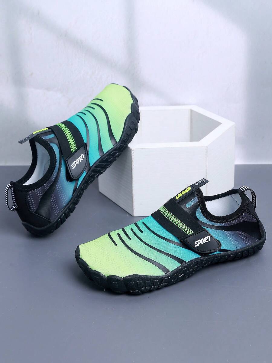 Boys orange lightweight sports water shoes featuring breathable mesh upper, hook loop closure, colorblock design, and non-slip rubber outsole.