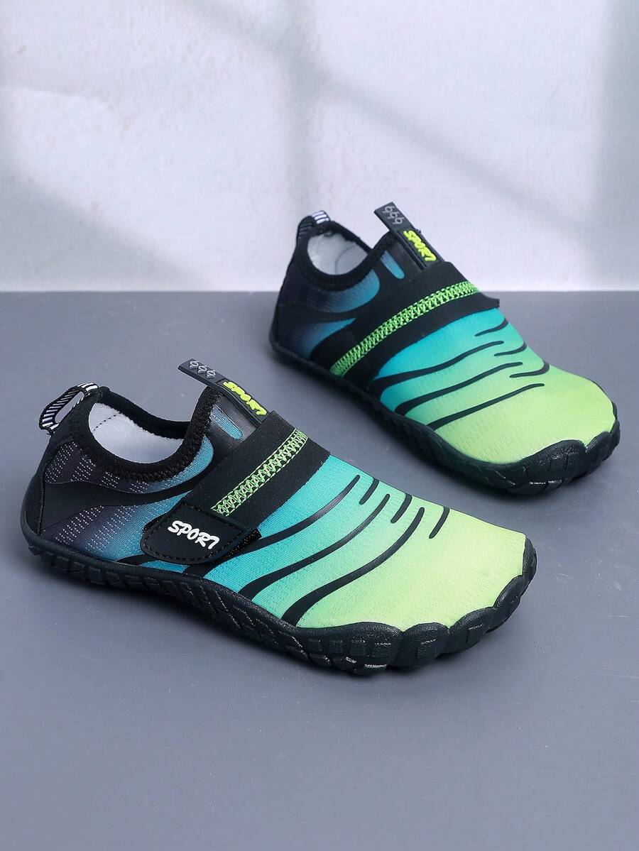 Boys orange lightweight sports water shoes featuring breathable mesh upper, hook loop closure, colorblock design, and non-slip rubber outsole.