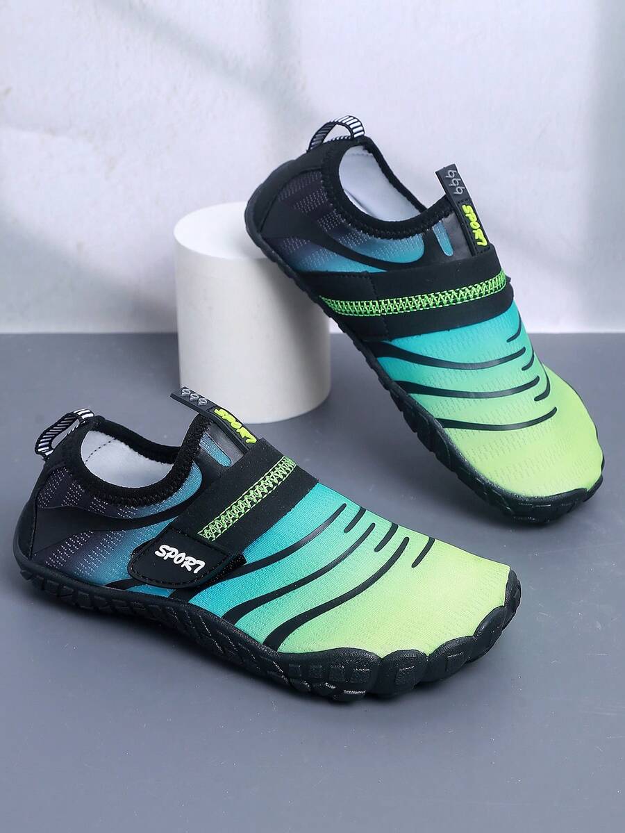 Boys orange lightweight sports water shoes featuring breathable mesh upper, hook loop closure, colorblock design, and non-slip rubber outsole.