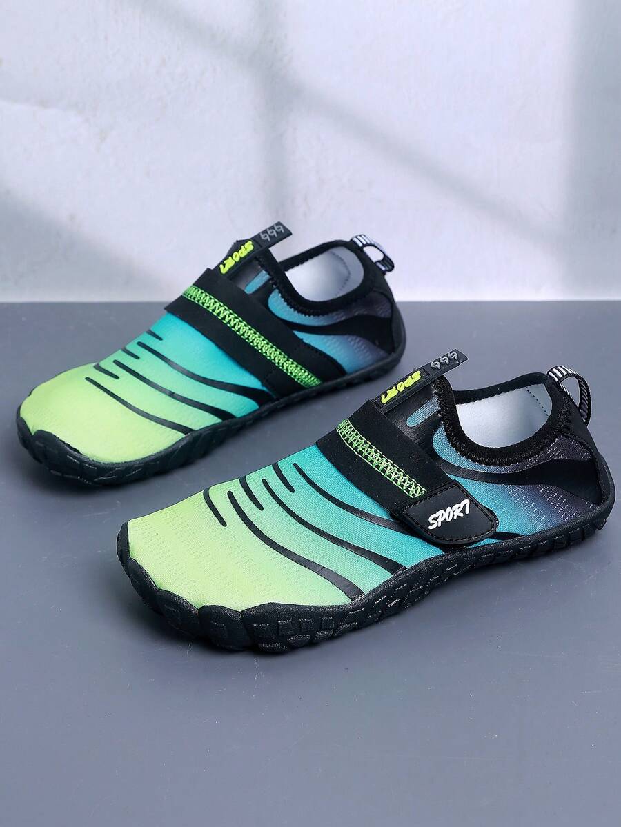 Boys orange lightweight sports water shoes featuring breathable mesh upper, hook loop closure, colorblock design, and non-slip rubber outsole.