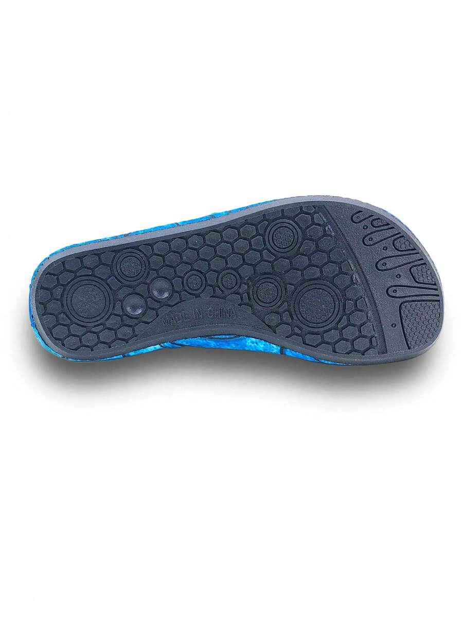 Boys red slip-on water shoes with spider pattern, breathable fabric upper, contrast binding details, and soft TPR outsole.
