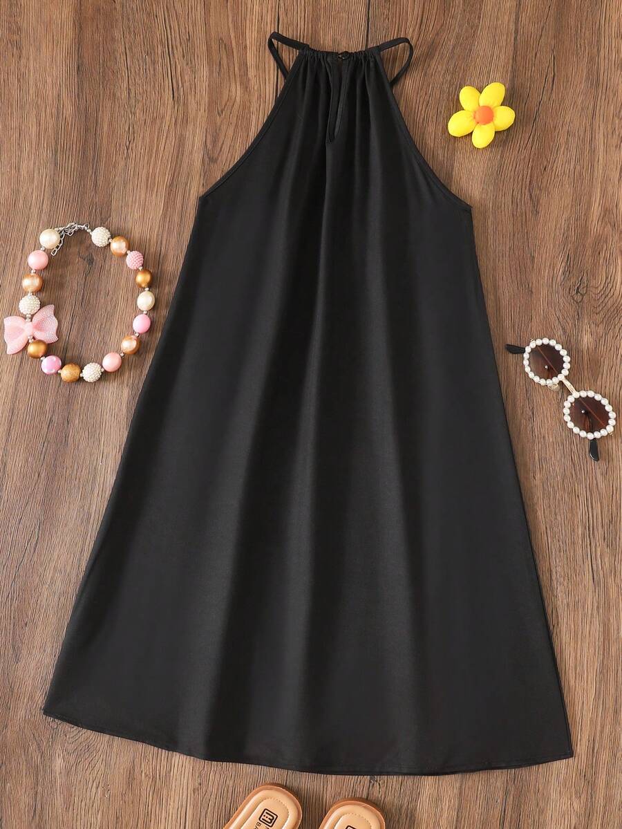 Tween girls floral halter A-line dress with contrast lace, applique and fringe details, sleeveless short length in polyester