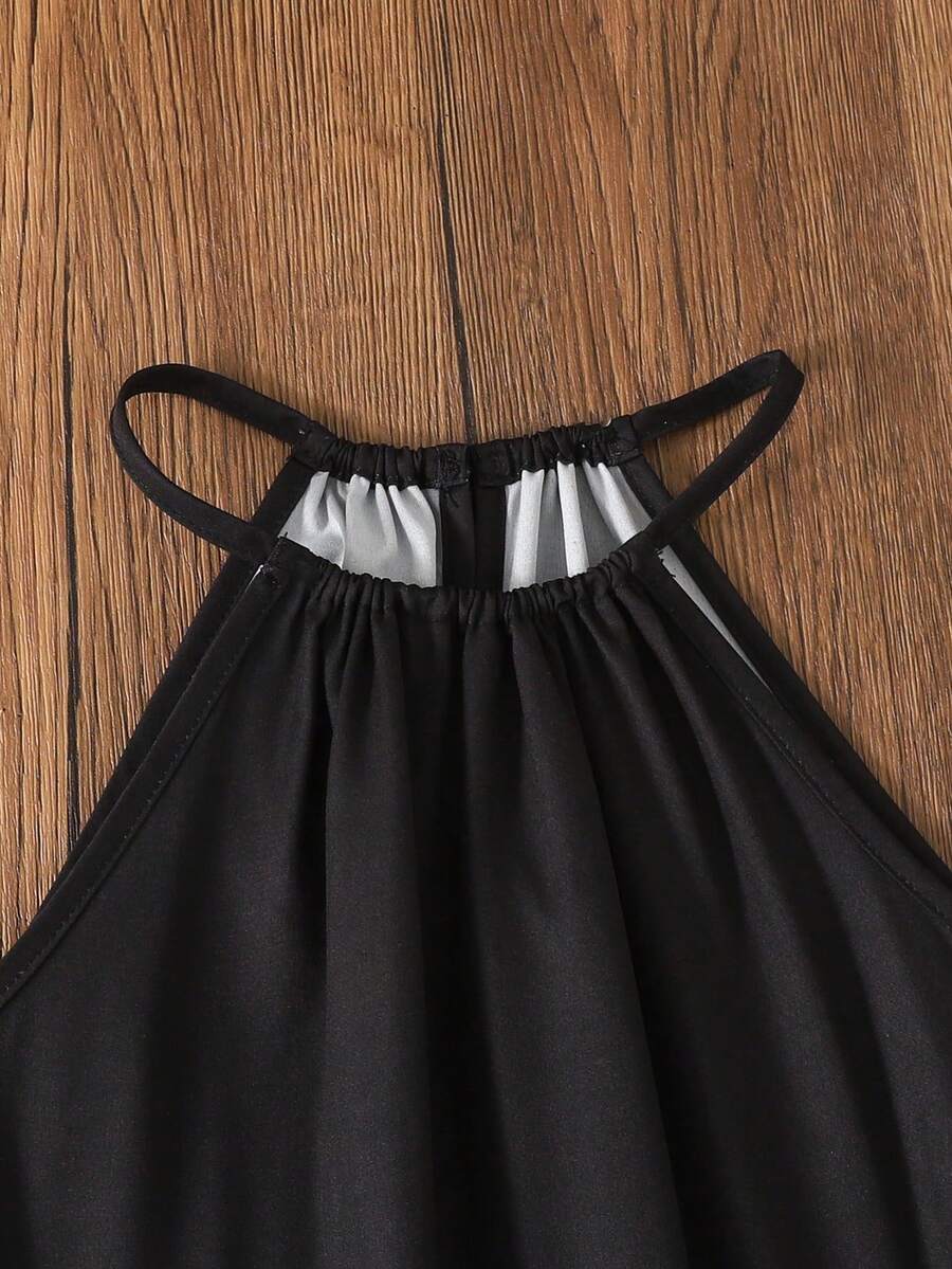 Tween girls floral halter A-line dress with contrast lace, applique and fringe details, sleeveless short length in polyester