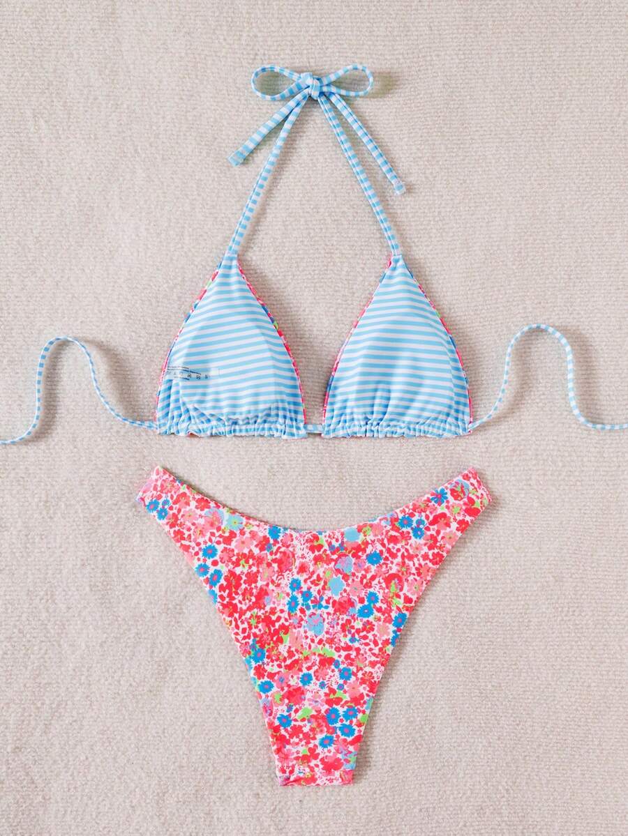 Women's two-piece halter bikini set featuring high cut thong bottoms and removable padding