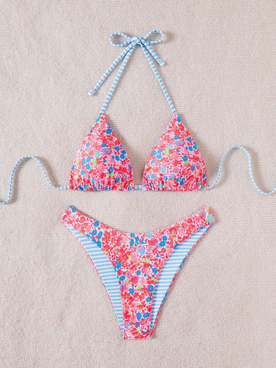 Women's two-piece halter bikini set featuring high cut thong bottoms and removable padding