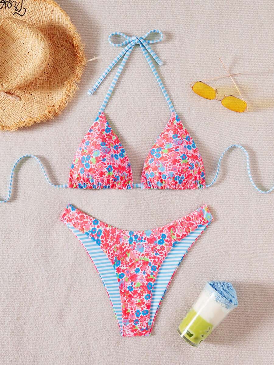 Women's two-piece halter bikini set featuring high cut thong bottoms and removable padding