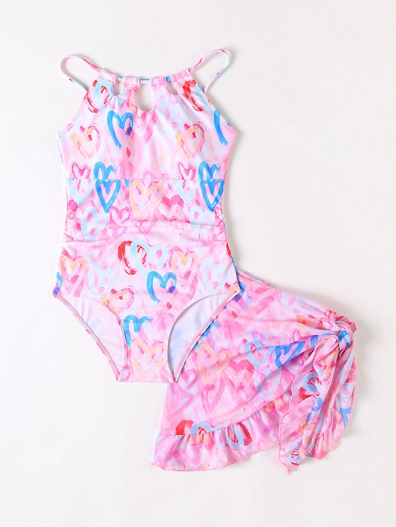 Girls black and white one-piece swimsuit set with cut-out detail, spaghetti straps, sleeveless fitted design, and matching skirt bottom for vacation swimwear.