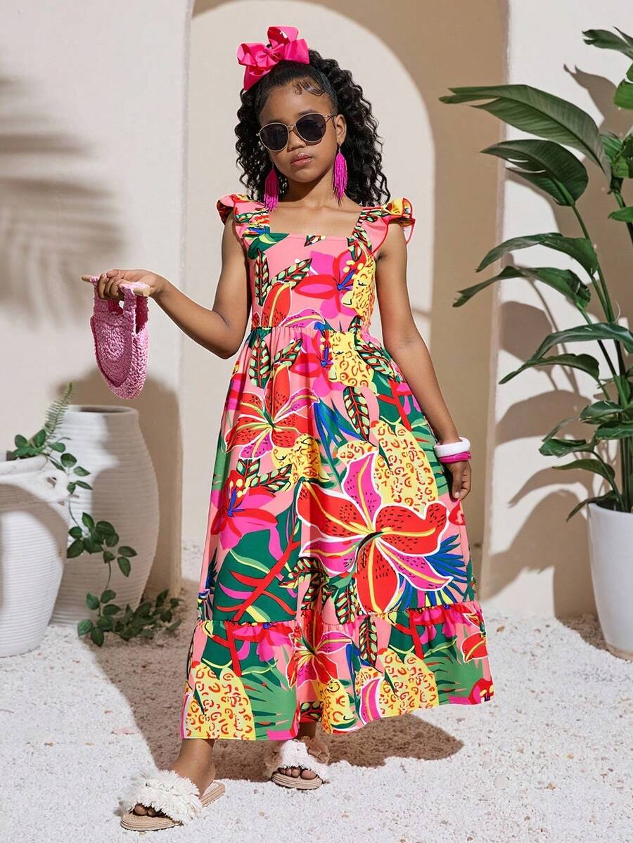 Blue floral print long vacation dress for tween girls featuring an A-line high waist silhouette with ruffle details and spaghetti straps.