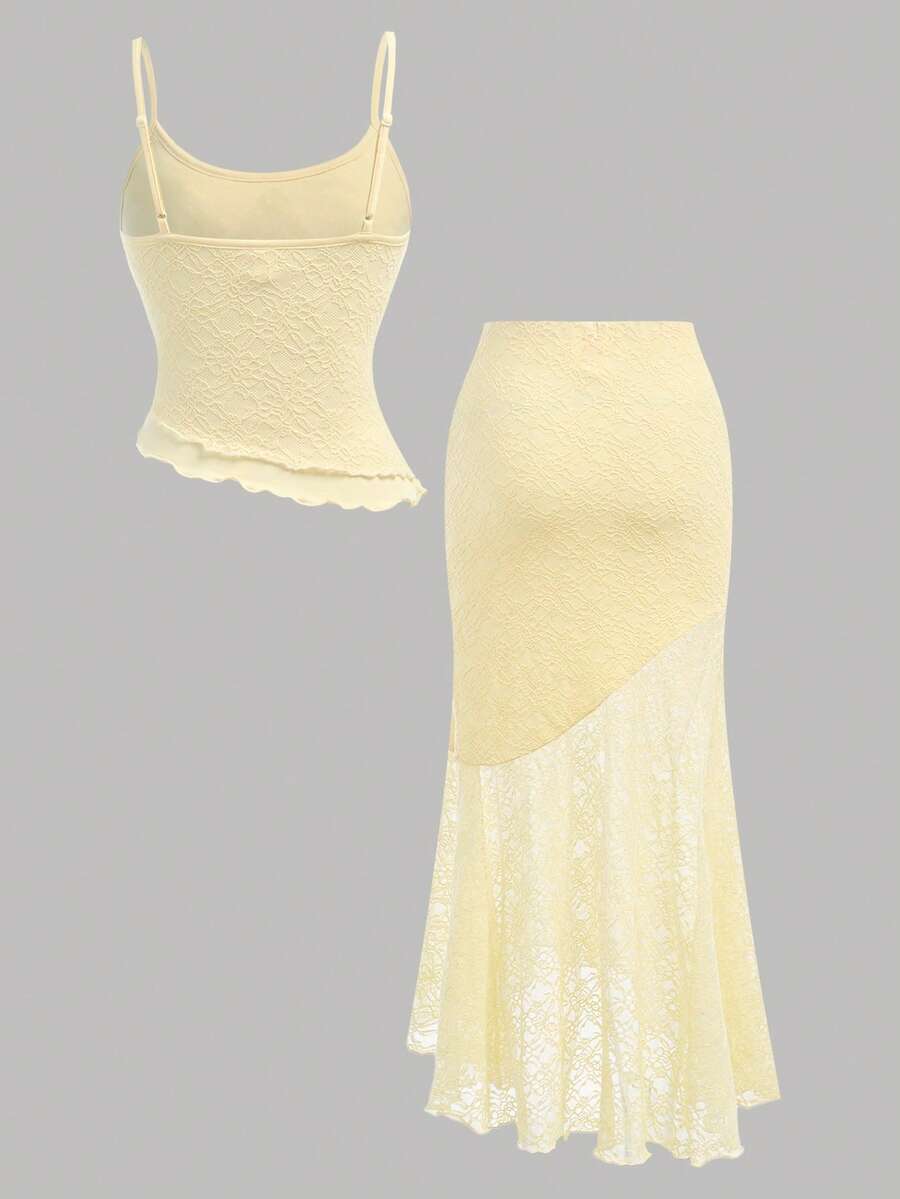 Tween girls blue 2-piece set featuring a short spaghetti strap lace tank top with asymmetrical lettuce trim and a long matching skirt.