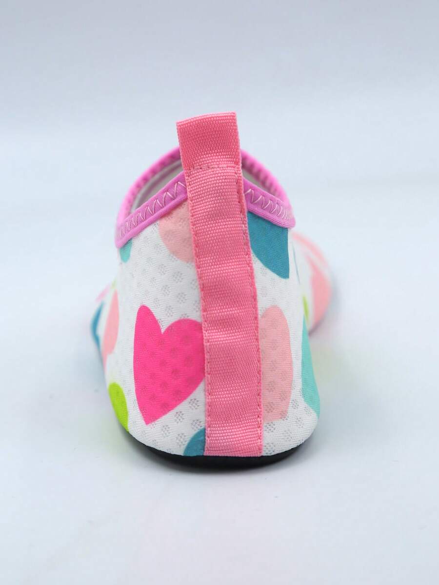 Multicolor kids slip-on water shoes with breathable Lycra upper and non-slip TPR outsole for boys and girls.