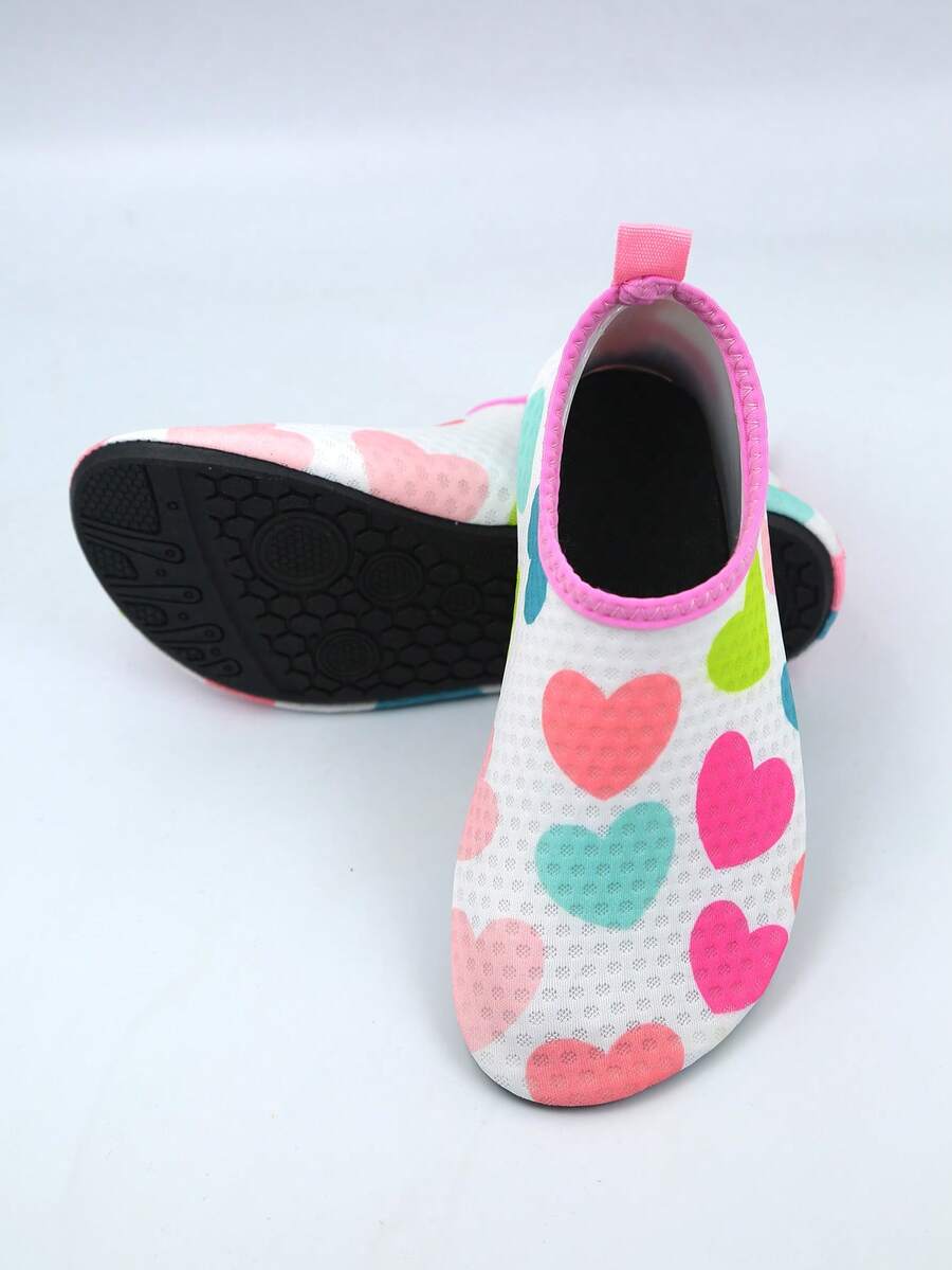 Multicolor kids slip-on water shoes with breathable Lycra upper and non-slip TPR outsole for boys and girls.