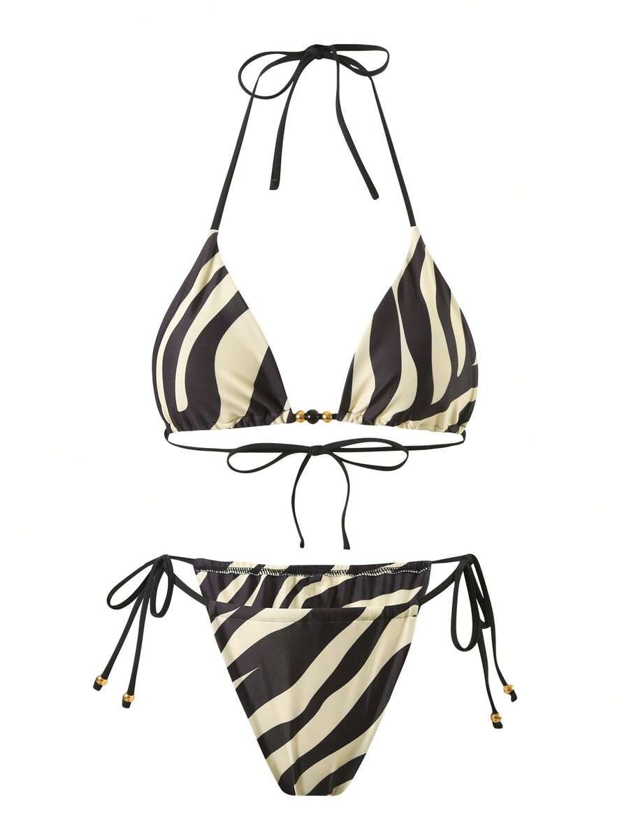 Women's 3-piece zebra print swimwear set featuring a wireless halter top, tie-side bottoms, and a long sheer mesh skirt cover-up.