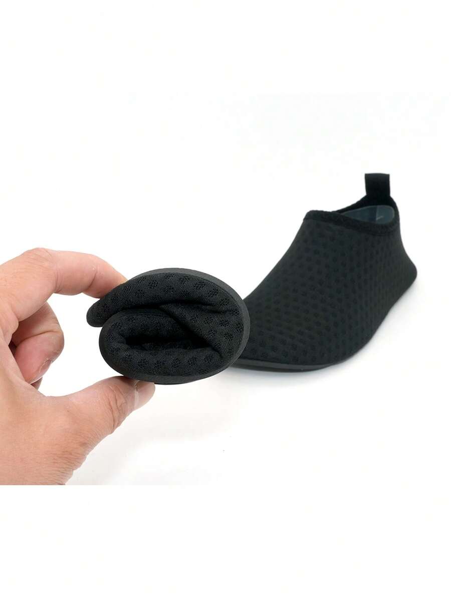 Boys breathable slip-on aqua water shoes featuring contrast binding and non-slip TPR soles for beach and outdoor activities.