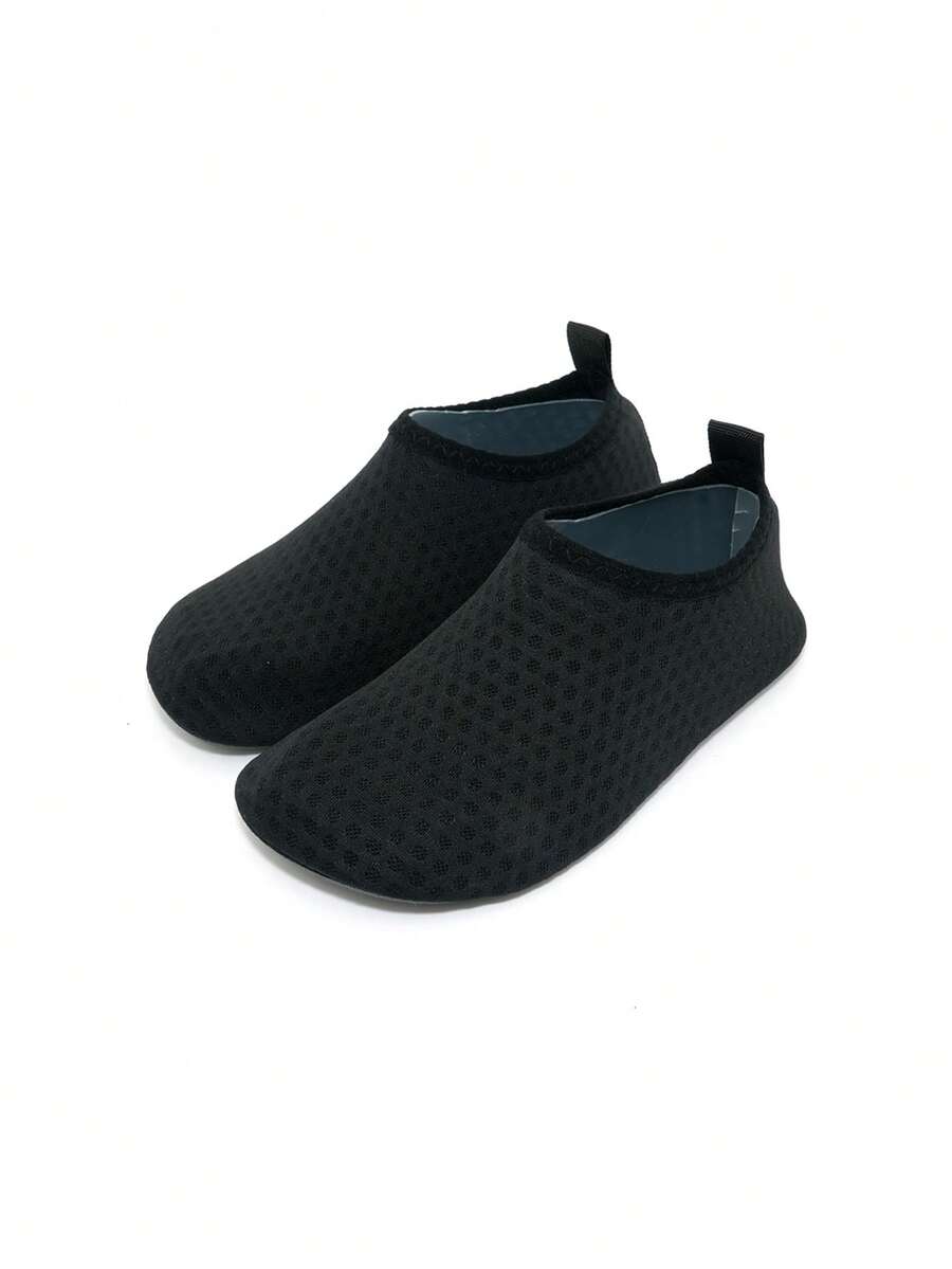 Boys breathable slip-on aqua water shoes featuring contrast binding and non-slip TPR soles for beach and outdoor activities.