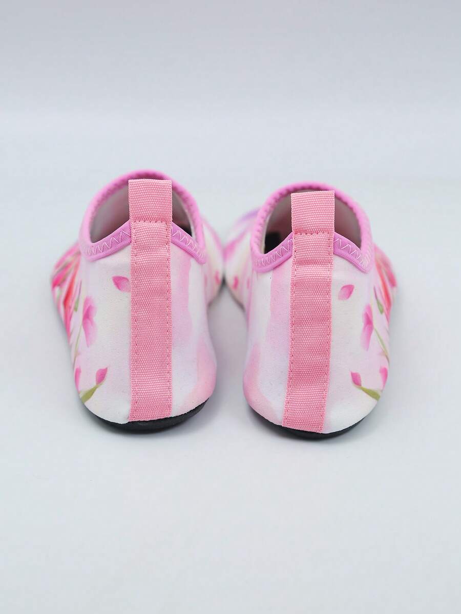 Kids slip-on aqua socks water shoes with breathable polyester upper and non-slip wear-resistant TPR outsole for boys and girls.