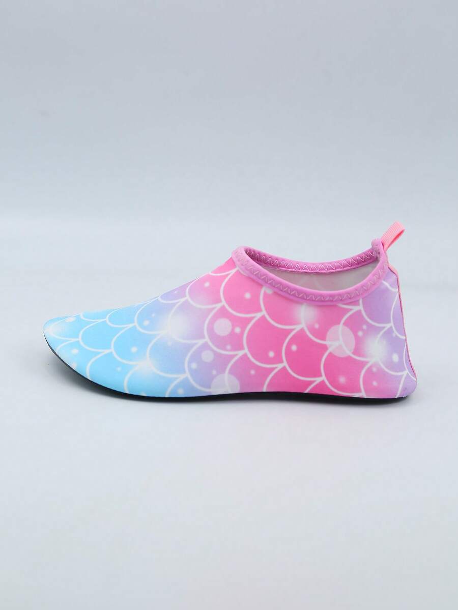 Kids slip-on aqua socks water shoes with breathable polyester upper and non-slip wear-resistant TPR outsole for boys and girls.