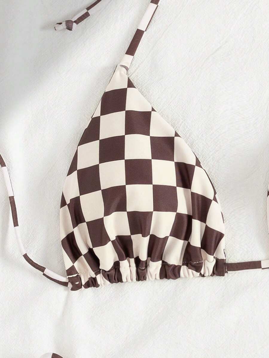 Multicolor striped halter neck two-piece bikini set featuring wireless triangle cups and low-waist tie-side bottoms.