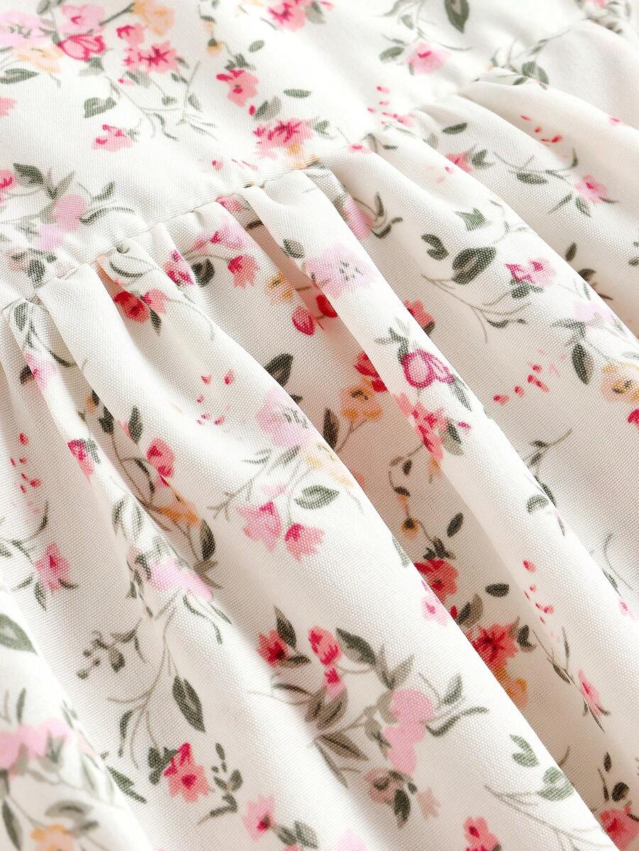 Tween girl pink ditsy floral camisole long dress with spaghetti straps, shirred ruched bust, high waist, and flared hem